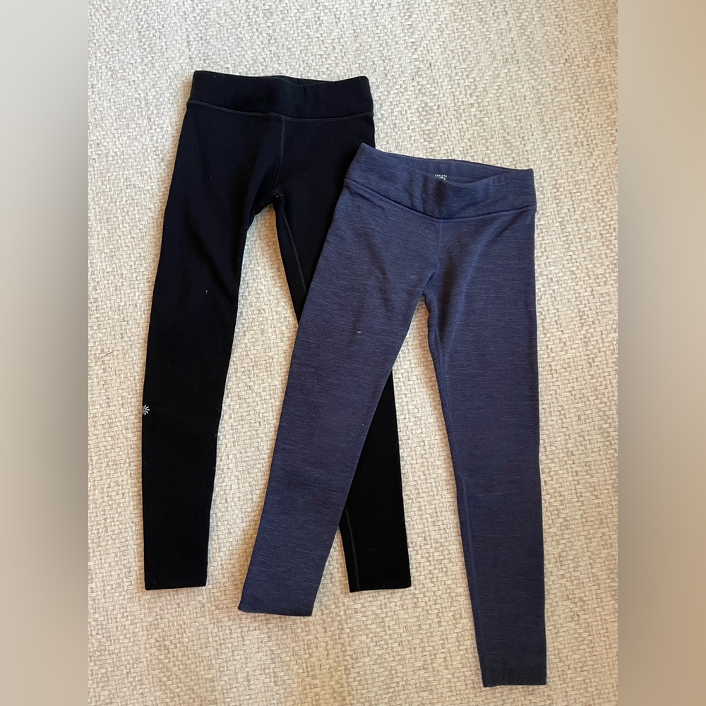 Athleta Girl fleece lined leggings. One black one blue. Each is size 8-10.